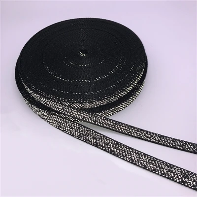 Weaver Textile présente une nouvelle sangle noire tissée réfléchissante à points irréguliers pour...